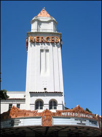 Tall building marked "MERCED"